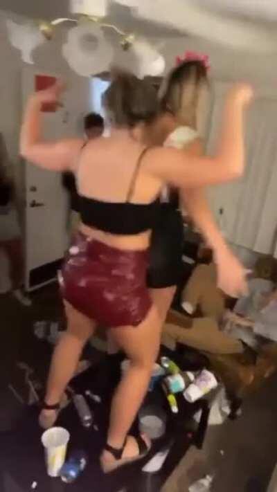 WCGW two girls dancing on a table.