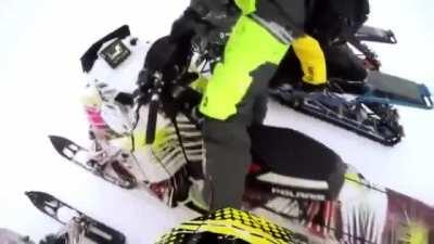 Guy pranks his friend putting the snowmobile in reverse