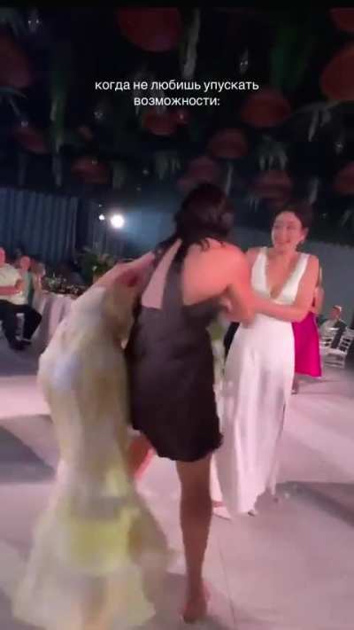 This woman at this weddings bouquet toss