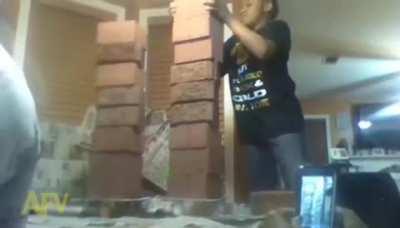 Stacking bricks on a glass table