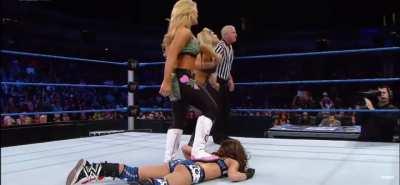 Natalya stepping on AJ