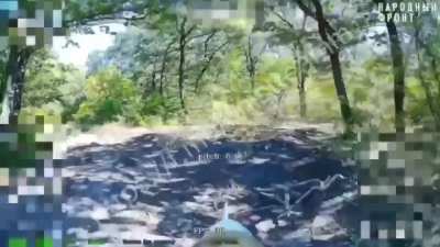 An Ukrainian managed to cut the fiber optic cable of one FPV drone, however another one was coming right behind, hitting him.