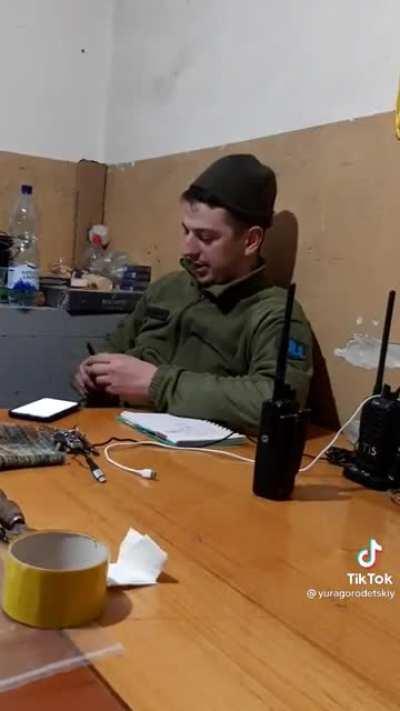 Ukranian soldier singing anthem of Kyiv