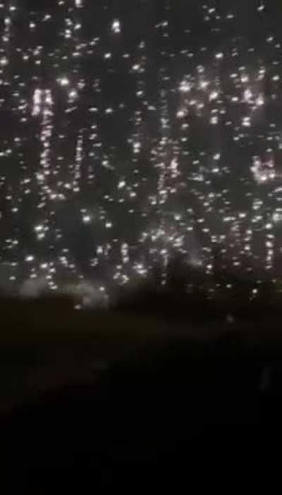 Surreal footage of Ukrainian serviceman caught directly under incendiary ordnance.