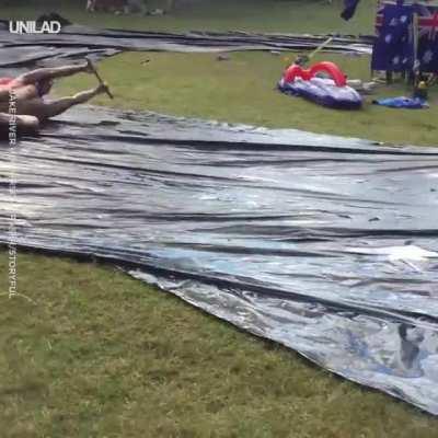 While I spin fast on this slip n slide