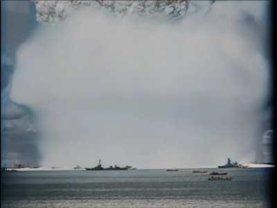 Atomic Bomb Test: Operation Crossroads, conducted by the US at Bikini Atoll, 1946. The purpose of the two-part tests was to investigate the effect of nuclear weapons on warships. The footage shown is from the second test 'Baker', detonated at 90 feet (27 