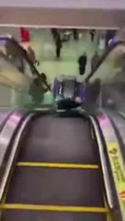 One of our new prototype Robotic Enhanced Tactical Advanced Retail Deployment units taking down a pair of shoplifters in [REDACTED] Plaza.