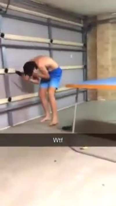 Kid throws ping pong paddle at his brother