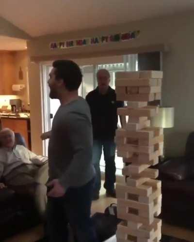 Jenga player makes the ultimate move