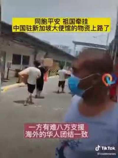 Westlite workers apparently receive provisions from Chinese embassy.