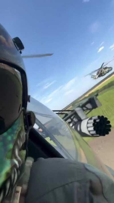 Ukrainian helicopter pilot takes a selfie during a flight