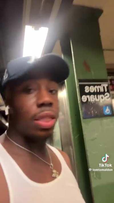 Napping right next to waiting seats for a train 