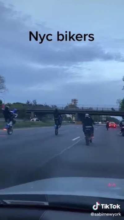 NYC bikers doing wheelies and taking over the highway