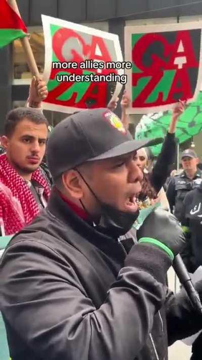 Rapper Immortal Technique speaks at the NYC protest against the bombing of Gaza