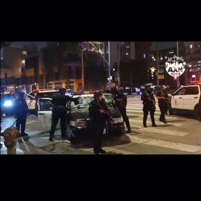 LAPD smashing their own car, for some reason. Why would they do that?
