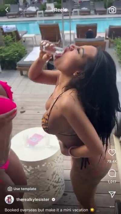 Shaking her titties and in robe