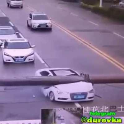 Amazing how the driver survived this light pole accident