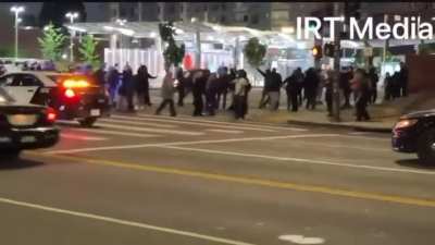 JUST IN: Anti-ICE rioters are now AMBUSHING LAPD officers and BUSTING THEIR WINDOWS while they’re in their cars.