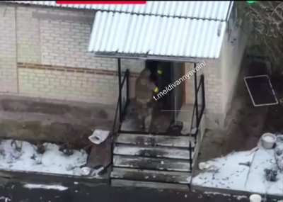 Ukrainian soldier walks into a house and gets shot