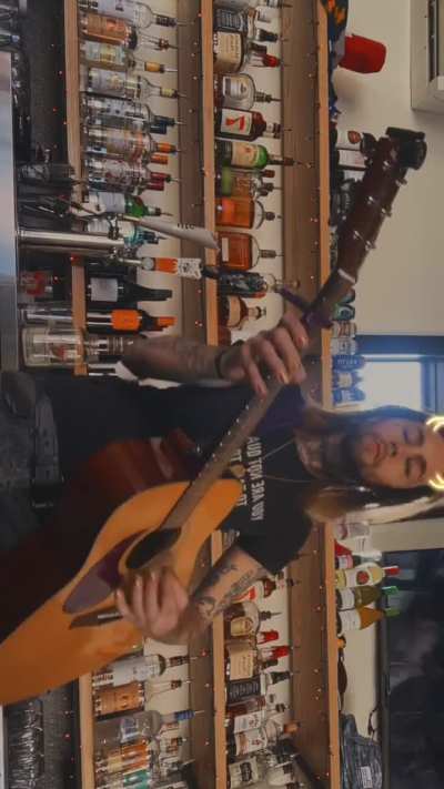 Between customers at the bar