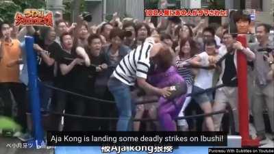Kota Ibushi gets ambushed by a mob on a Japanese Variety TV Show, proceeds to wrestle Aja Kong in the middle of an empty street [Subtitled]