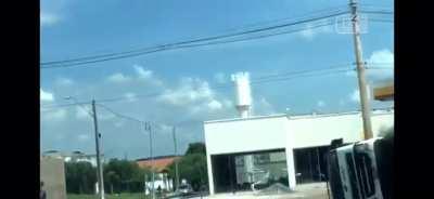 Helping a truck driver getting away of the truck on fire carrying 37 thousands liters of petrol