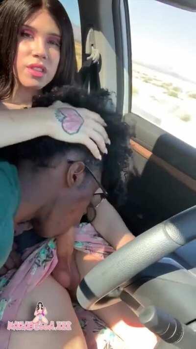 Karabella gets a blowjob while driving her car (gif)
