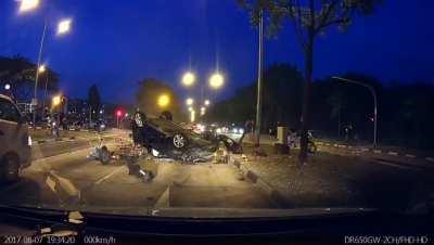 (Singapore) Car flipped over and hit a rider, only for the rider to be run over by another vehicle