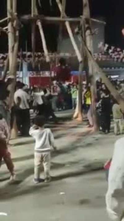 Winning a prize in the Stupid Carnival. (Sorry for the bad quality)