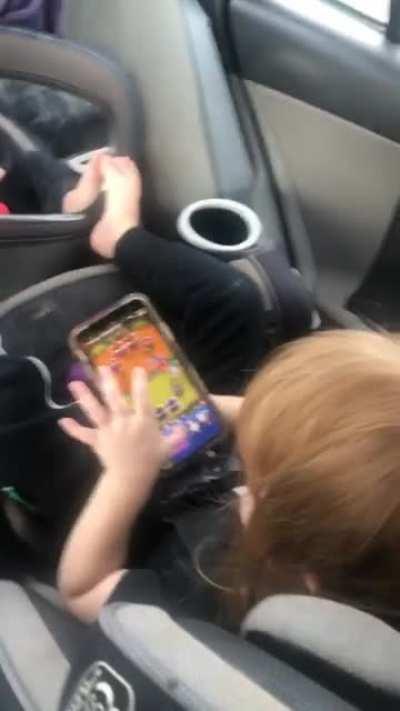 My 2 Year Old Daughter Playing Clash Royale In The Car