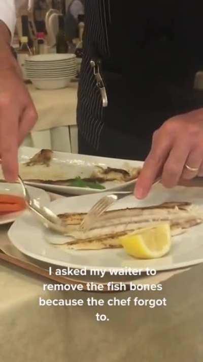 Removing fish bones with a spoon