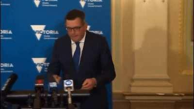 Church official getting psyched before sermon