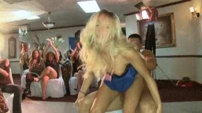 Blushing bride to be enjoying her bachelorette party a little too much