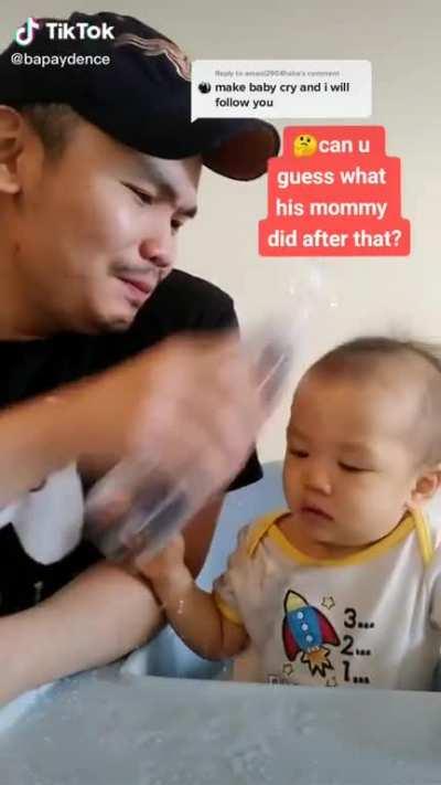 Making a baby cry for views.