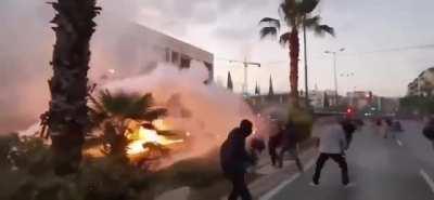 Greek demonstrators hurl Molotovs at the US embassy in Athens