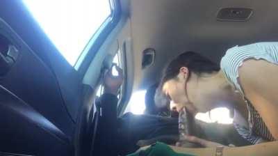 Sucking that big fat cock on the backseat