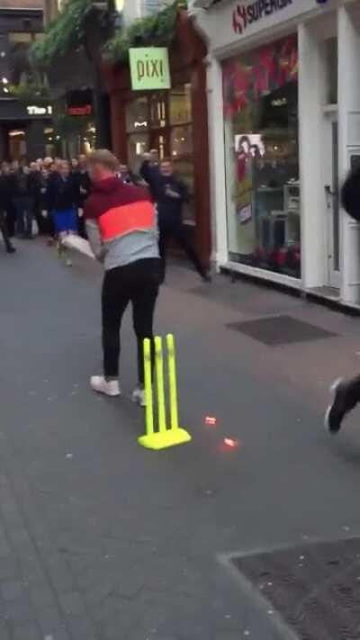 Joe Root bowling Ben Stokes out in the streets of London. Incredible send off