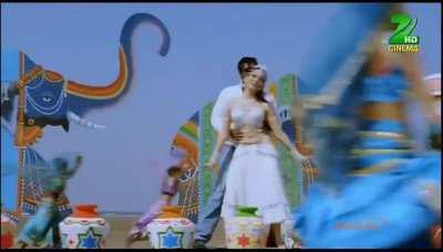 Even Ajay Devgn couldn't resist grabbing Tamannaahs milky belly!