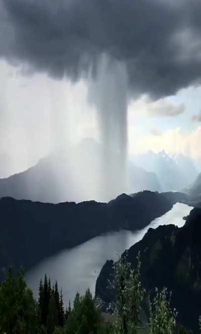 Exploding rain clouds over Lake Millstadt, Austria