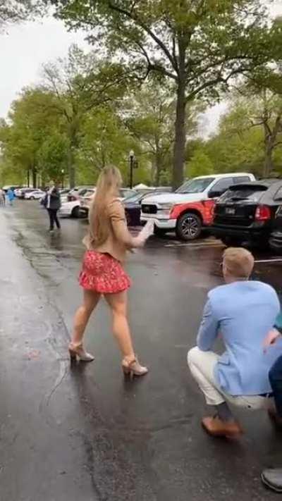 WCGW Playing baseball in heels on a wet surface.