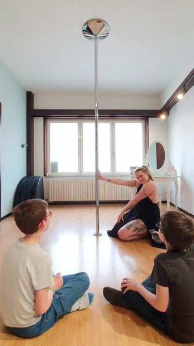 Pole dancing in your underwear in front of your children. WTF