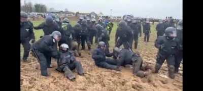 The mud, the monk and the cops