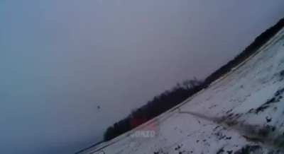 GoPro footage of Russians soldiers narrowly avoiding a Ukrainian FPV drone, winter 2025