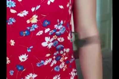 Hummingbird finds a flowered-print dress, tries to feed on the flowers.