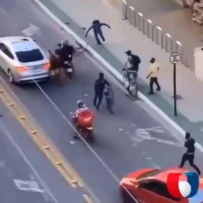 Phone snatcher gets chased by the entire town and wrecked