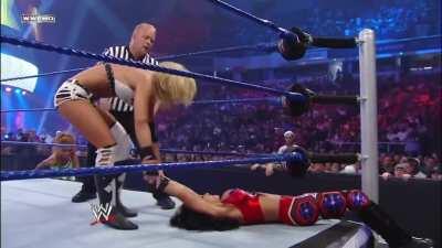 Michelle's prediction comes true: she humiliates Melina and takes her title