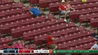 Collision in foul territory between Brewers and Reds fans. Tense drama ensues.