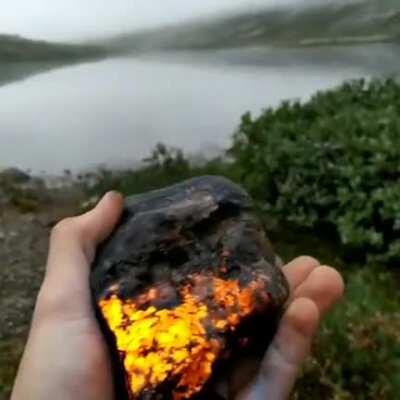 This radiant Sodalite mineral rock. Tenebrescence is the ability of minerals to change color when exposed to light.