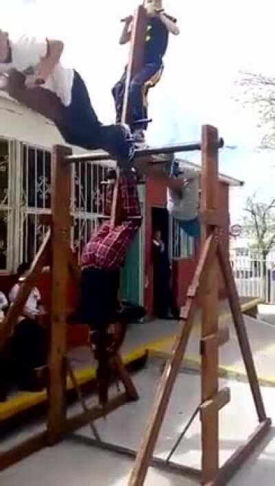 kids on a playground ride