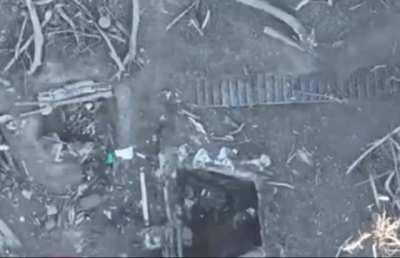 A Russian soldier tried to throw a drone dropped grenade away but it explodes in his hand instead.